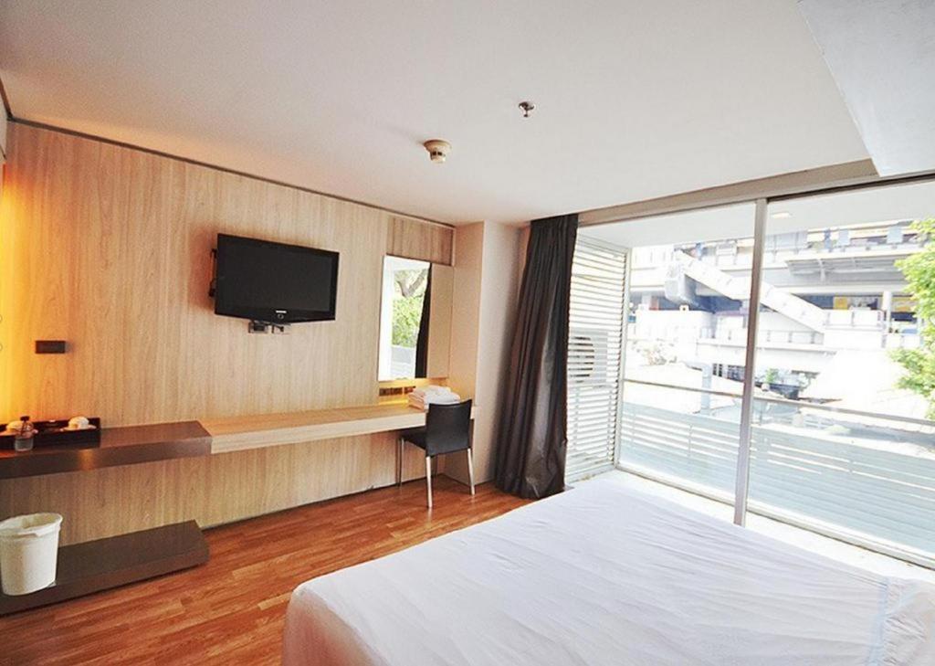 The Heritage Silom Hotel Bangkok Exterior photo